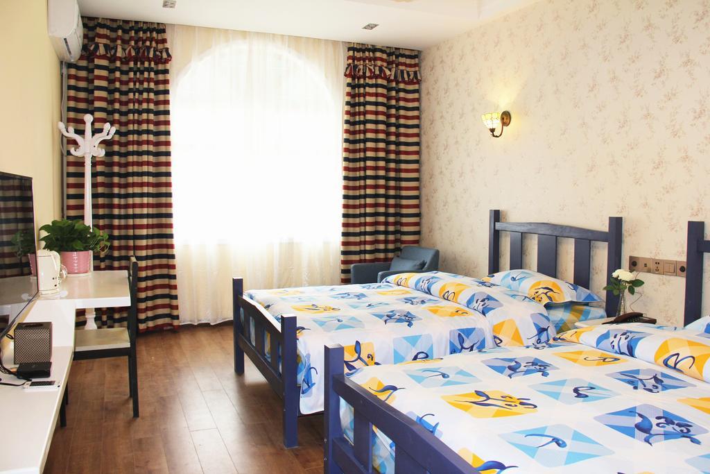 Raimi Hotel Chaqiyu Camera foto